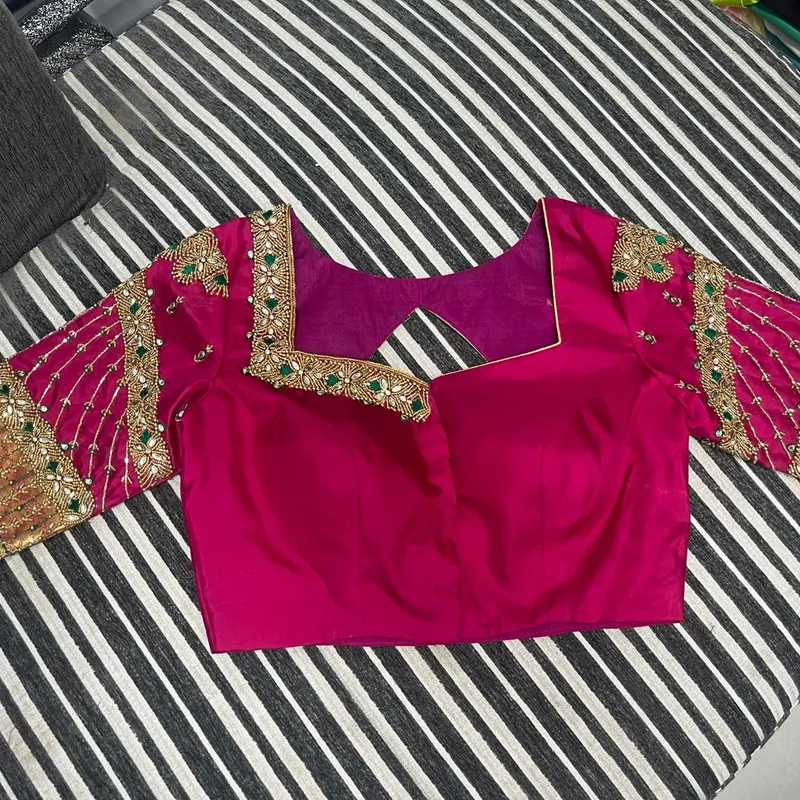 Pink bridal blouse front view with detailed gold embroidery