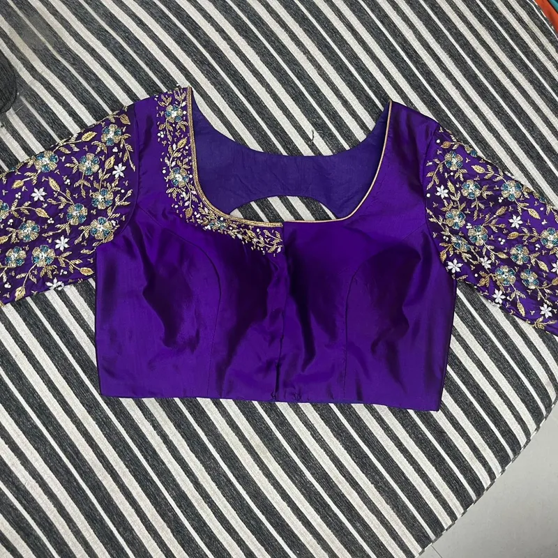 Purple embroidery blouse front view with intricate sleeve work