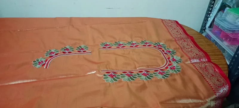 Peach fabric with red and green leaf embroidery pattern — full layout