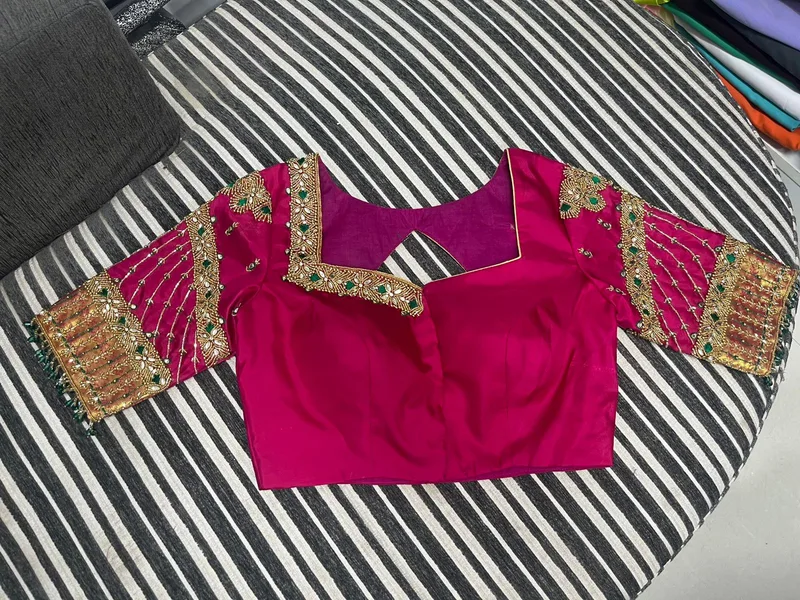 Pink bridal blouse front view with detailed gold embroidery