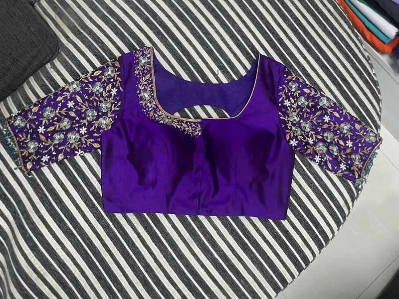 Purple embroidery blouse front view with intricate sleeve work